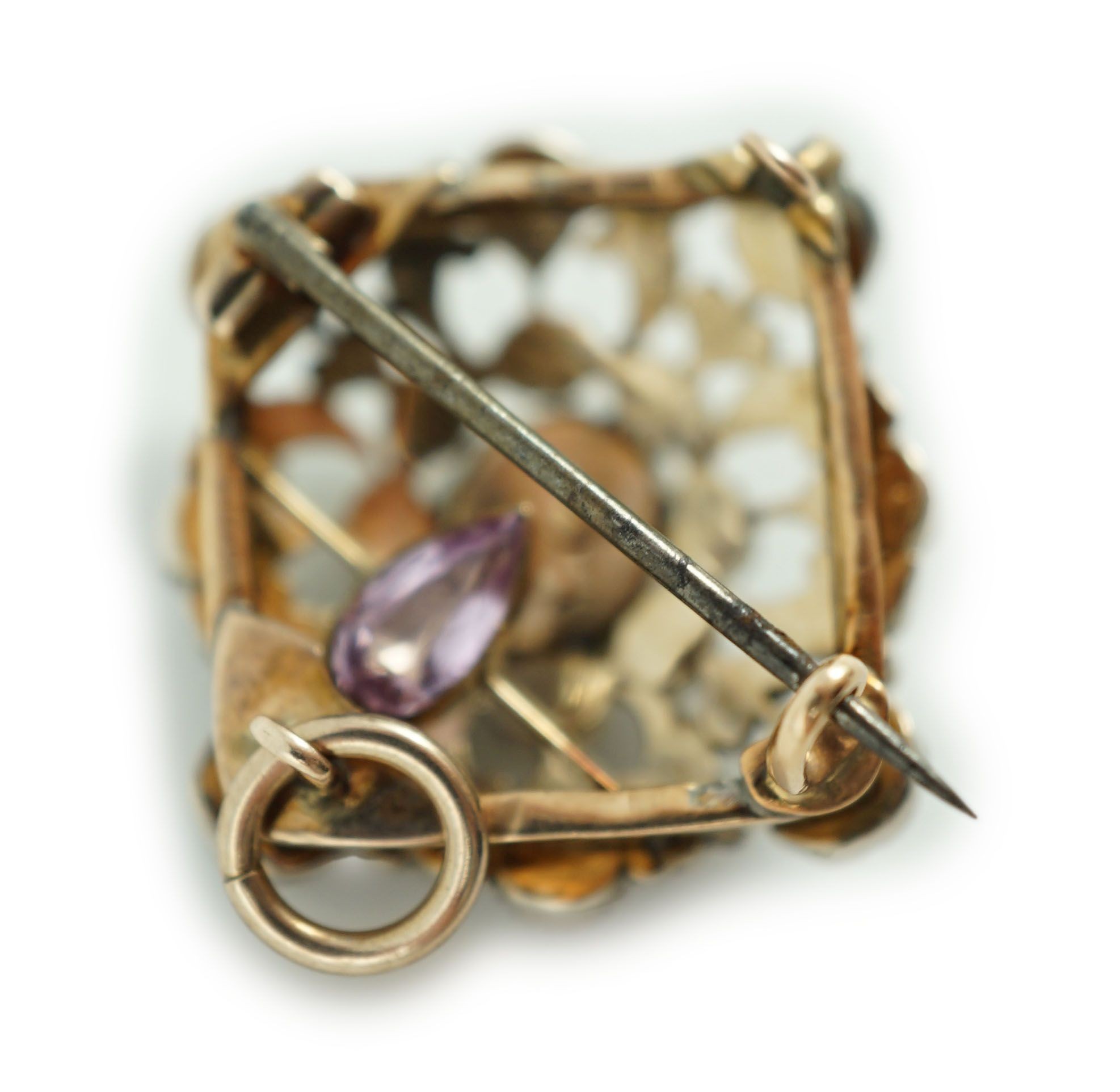 A Victorian pierced gold, silver and rose cut diamond set pendant brooch